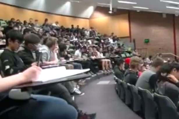 Watch_moment_student_viewing_porn_in_lecture_theatre_is_rumbled_-_because_his_headphones_werent_in1