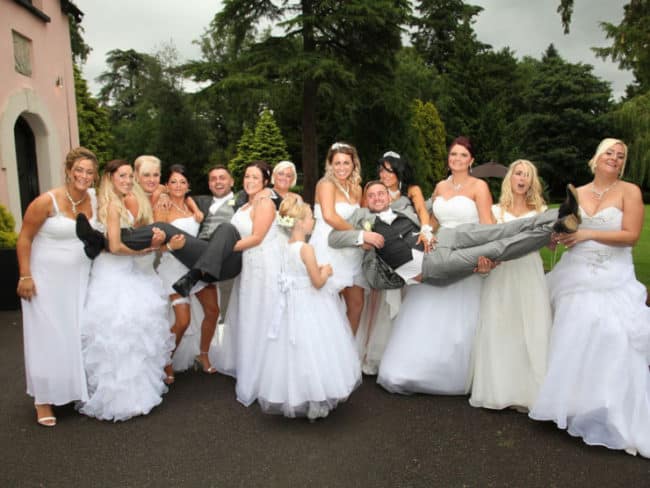 This_Gay_Couple_Asked_All_Their_Bridesmaids_To_Wear_Wedding_Dresses