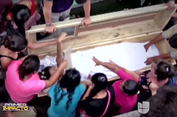 Dead_teen_wakes_screaming_inside_coffin_as_family_members_smash_tomb_-_before_dying_again2
